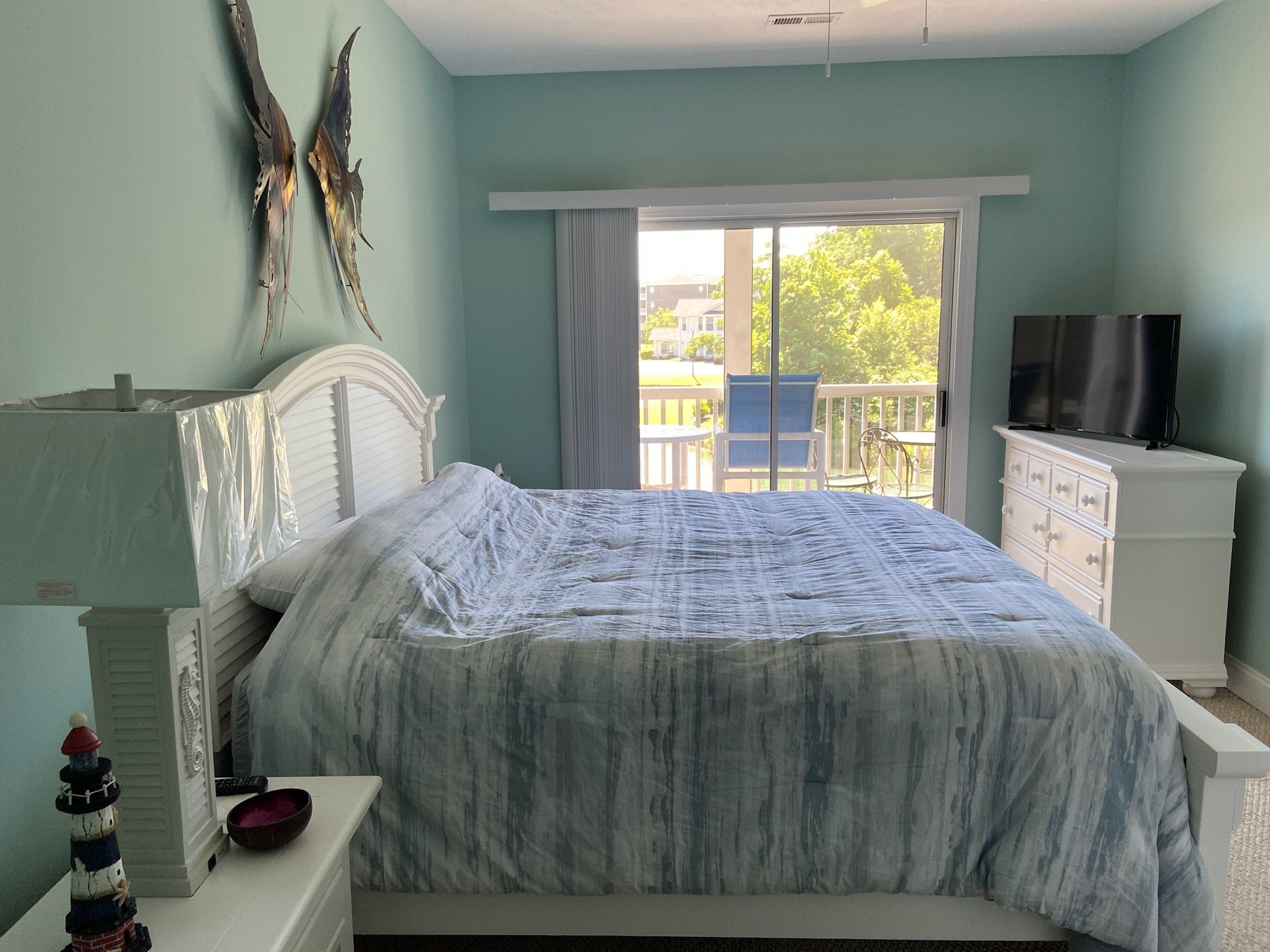 King size bed, tv, and private bathroom